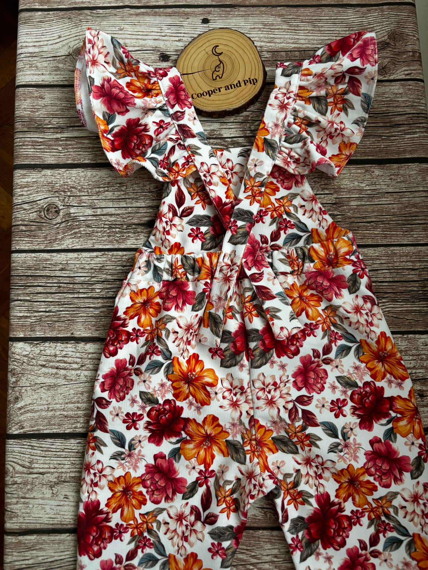 Cross back ruffles dungaree Printed corduroy