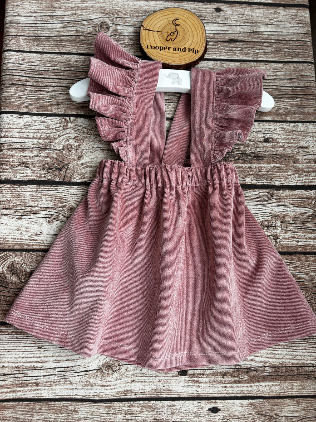 Cross back skirt with ruffled straps