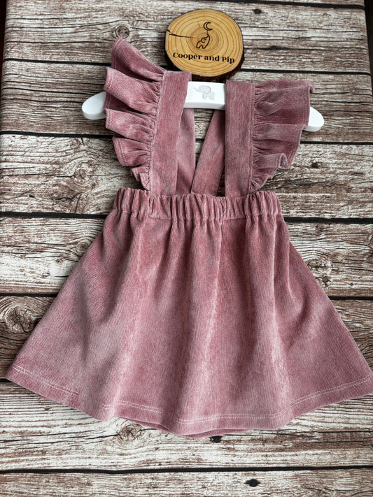 Cross back skirt with ruffled straps Printed corduroy